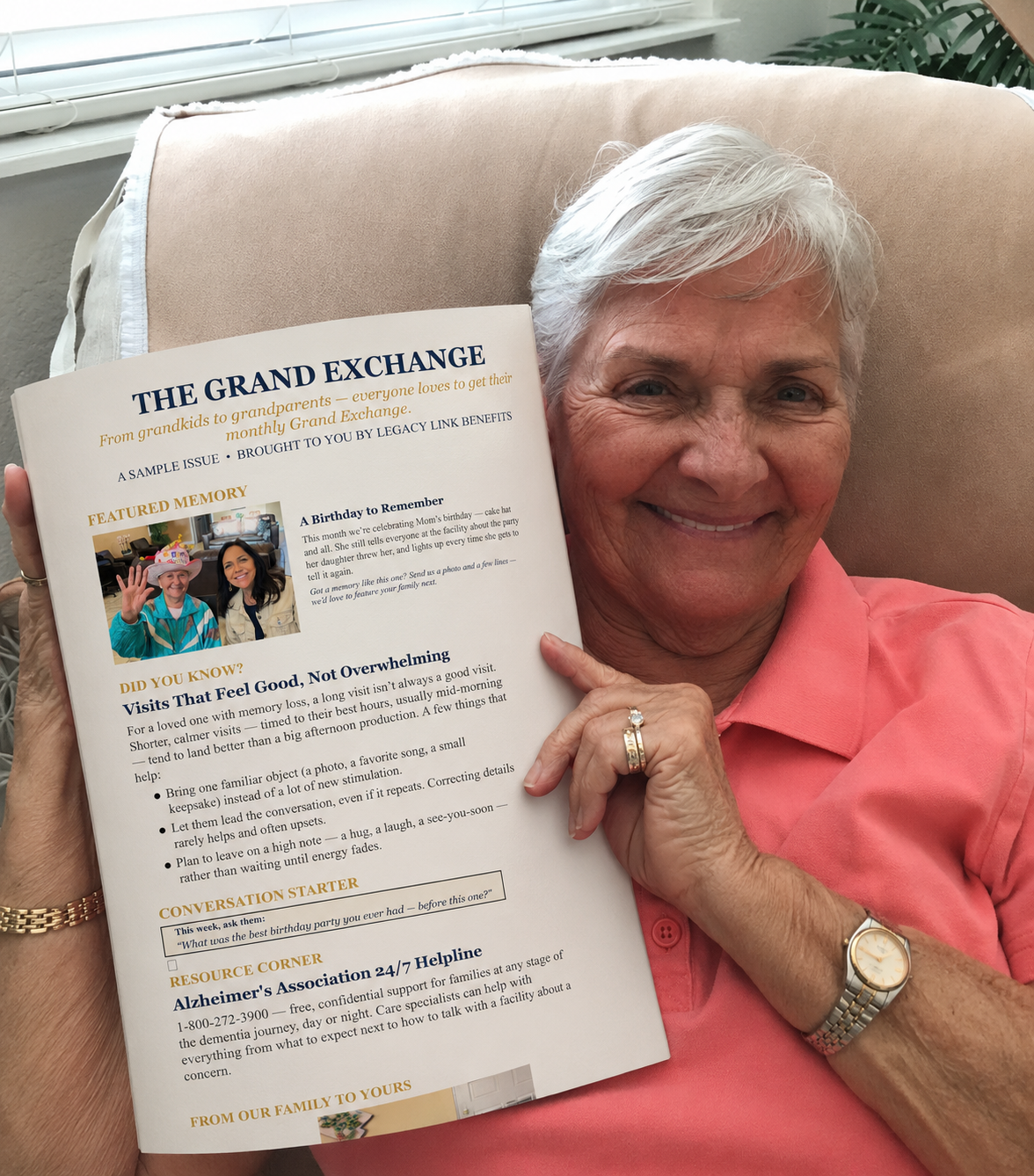 A smiling senior holding her printed copy of The Grand Exchange newsletter